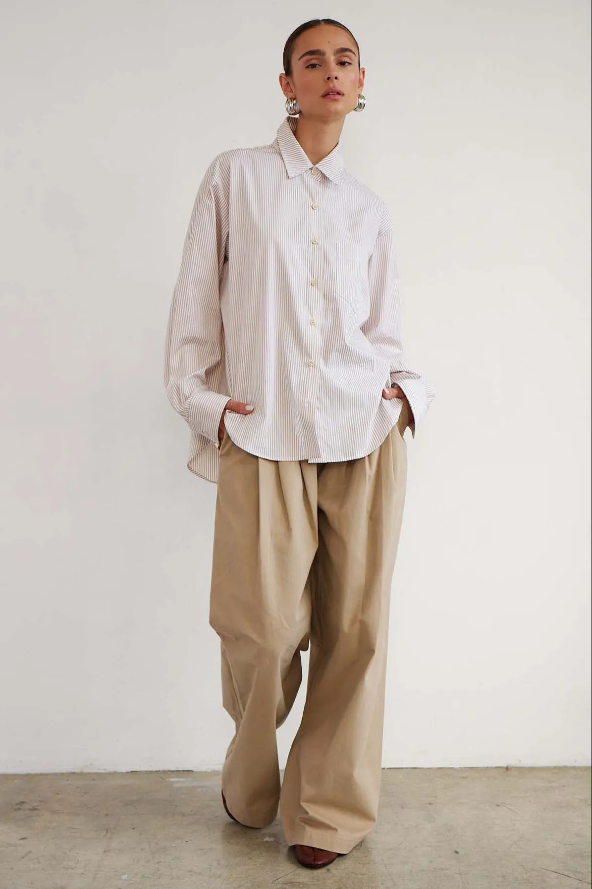 The Triple Pleat Pant in Tan sold by Jamie Haller