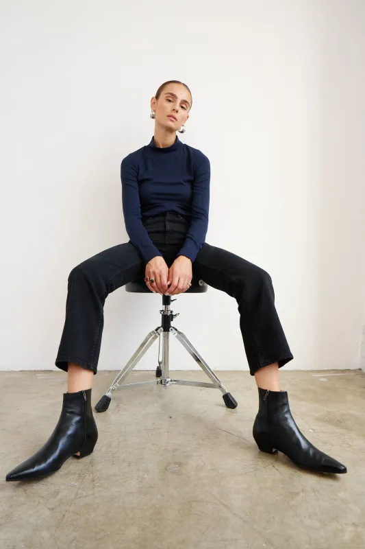 The Mock Neck in Navy sold by Jamie Haller