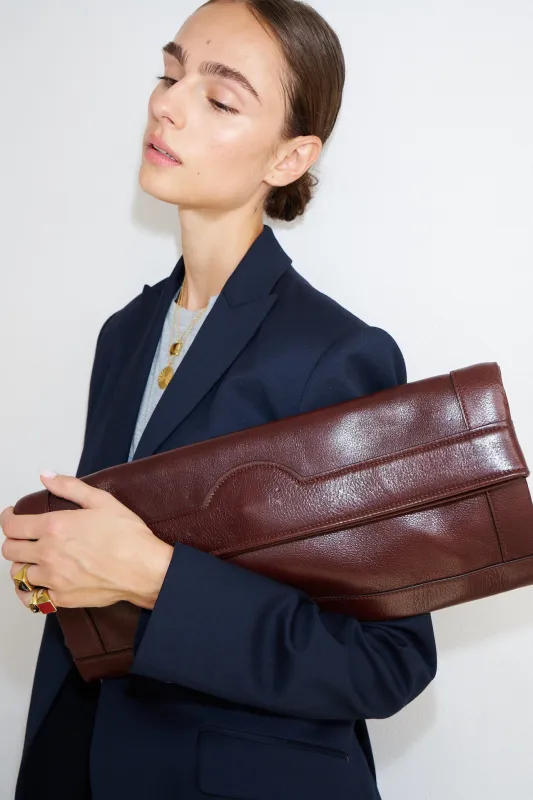 The Document Clutch in Oxblood sold by Jamie Haller