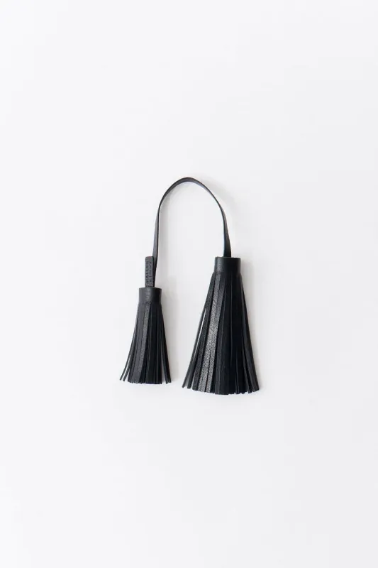 The Fringe Tassel Tie in Black made by Jamie Haller