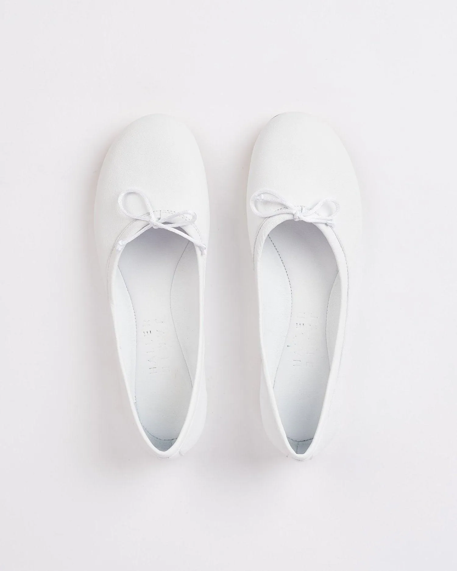 The Ballet Slipper in White sold by Jamie Haller