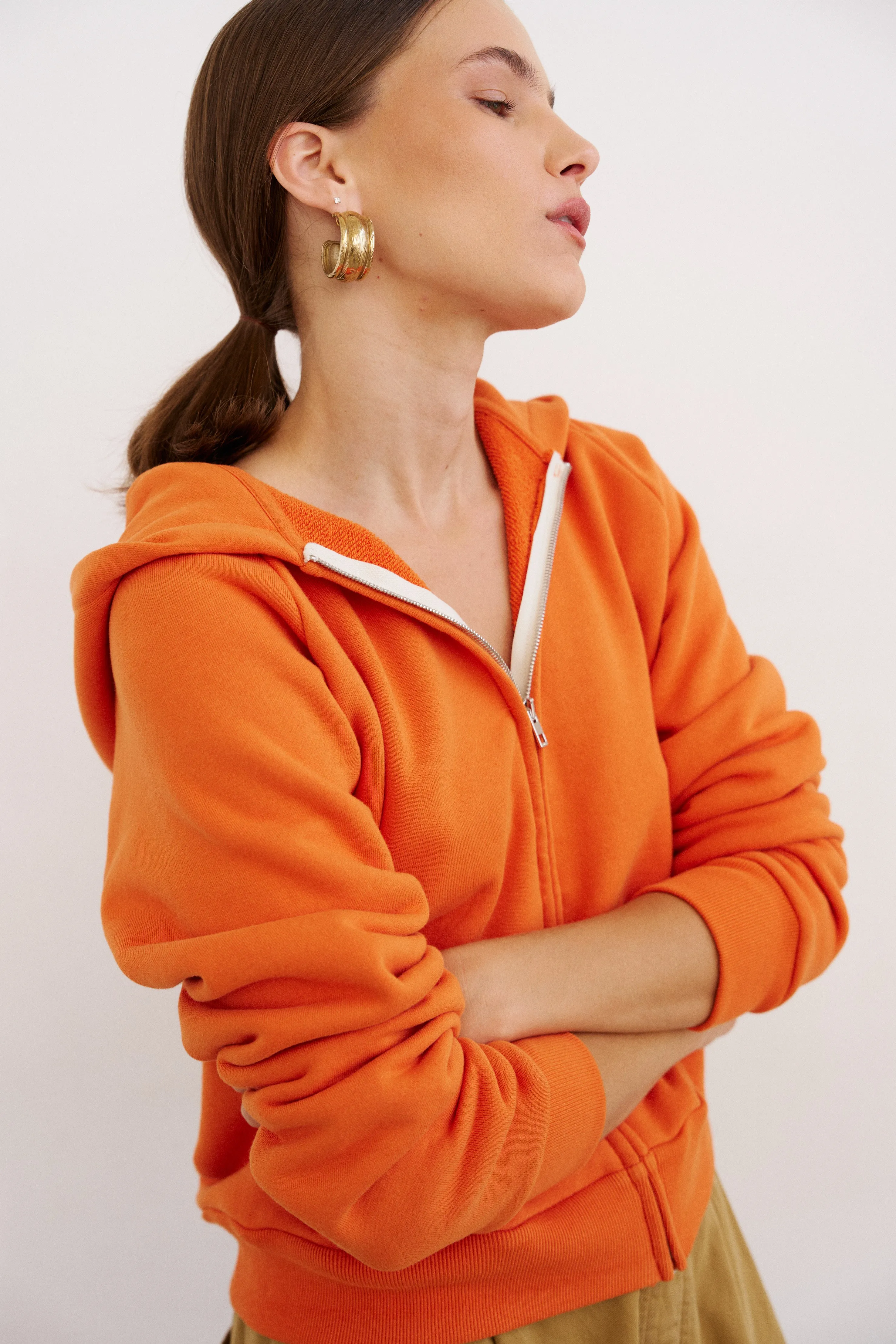 The Bird Hoodie in Orange sold by Jamie Haller
