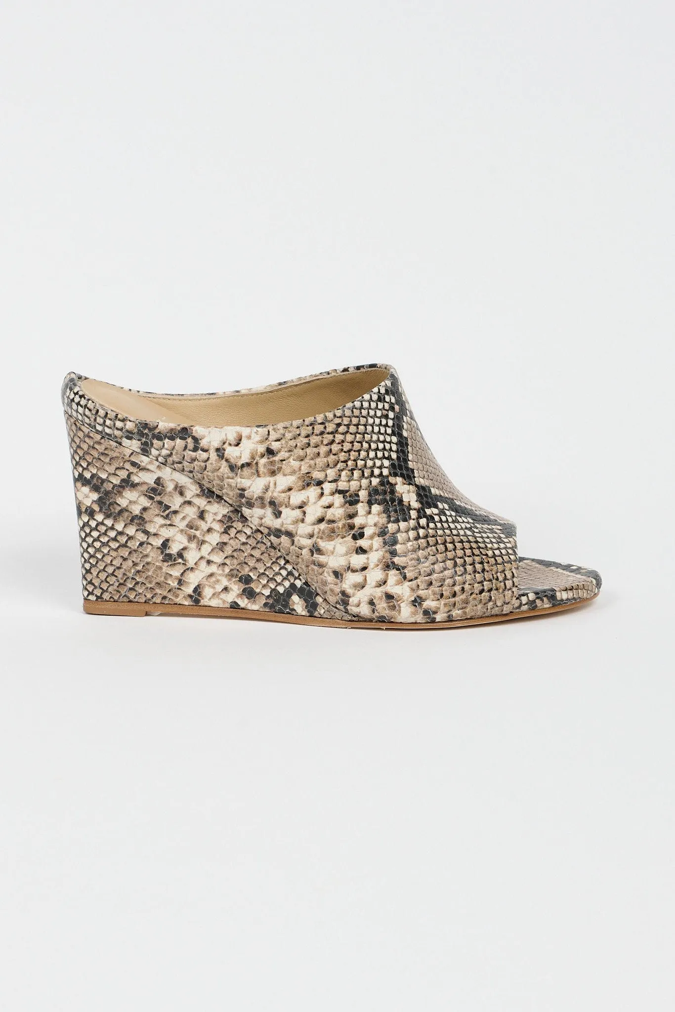 The High Slide in Taupe Python sold by Jamie Haller