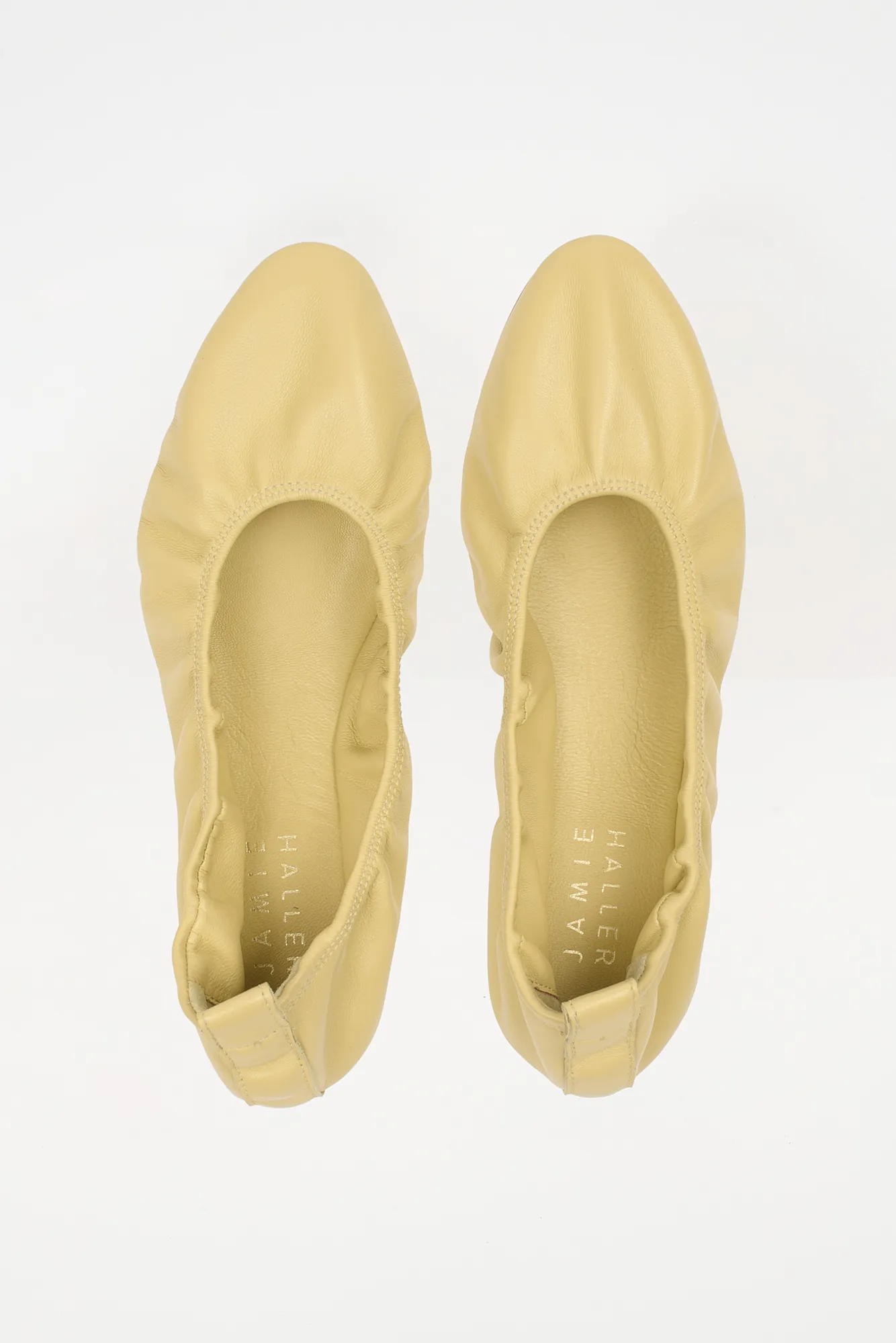 The Cove Slipper in Butter sold by Jamie Haller
