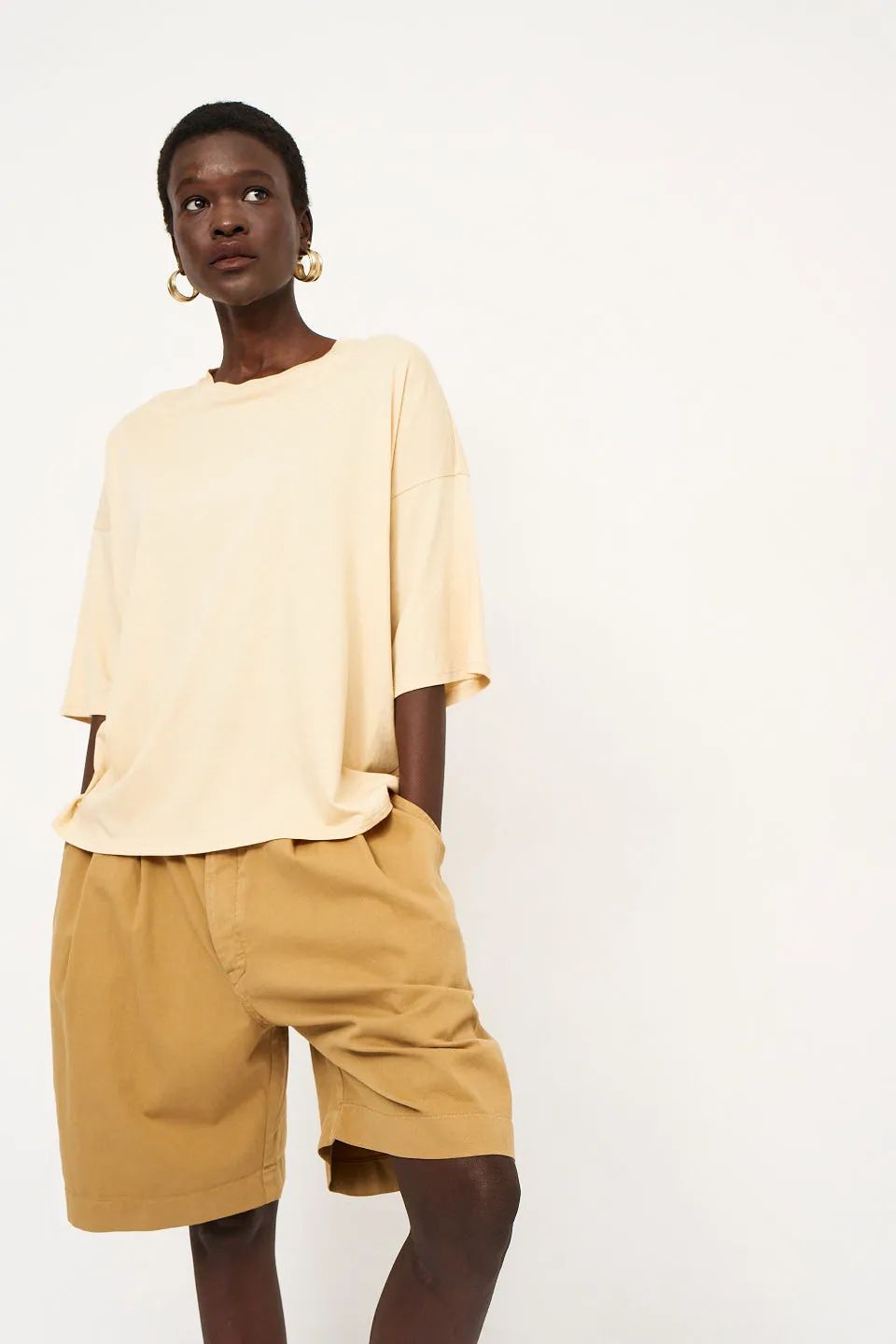 The Draped Tee in Butter sold by Jamie Haller