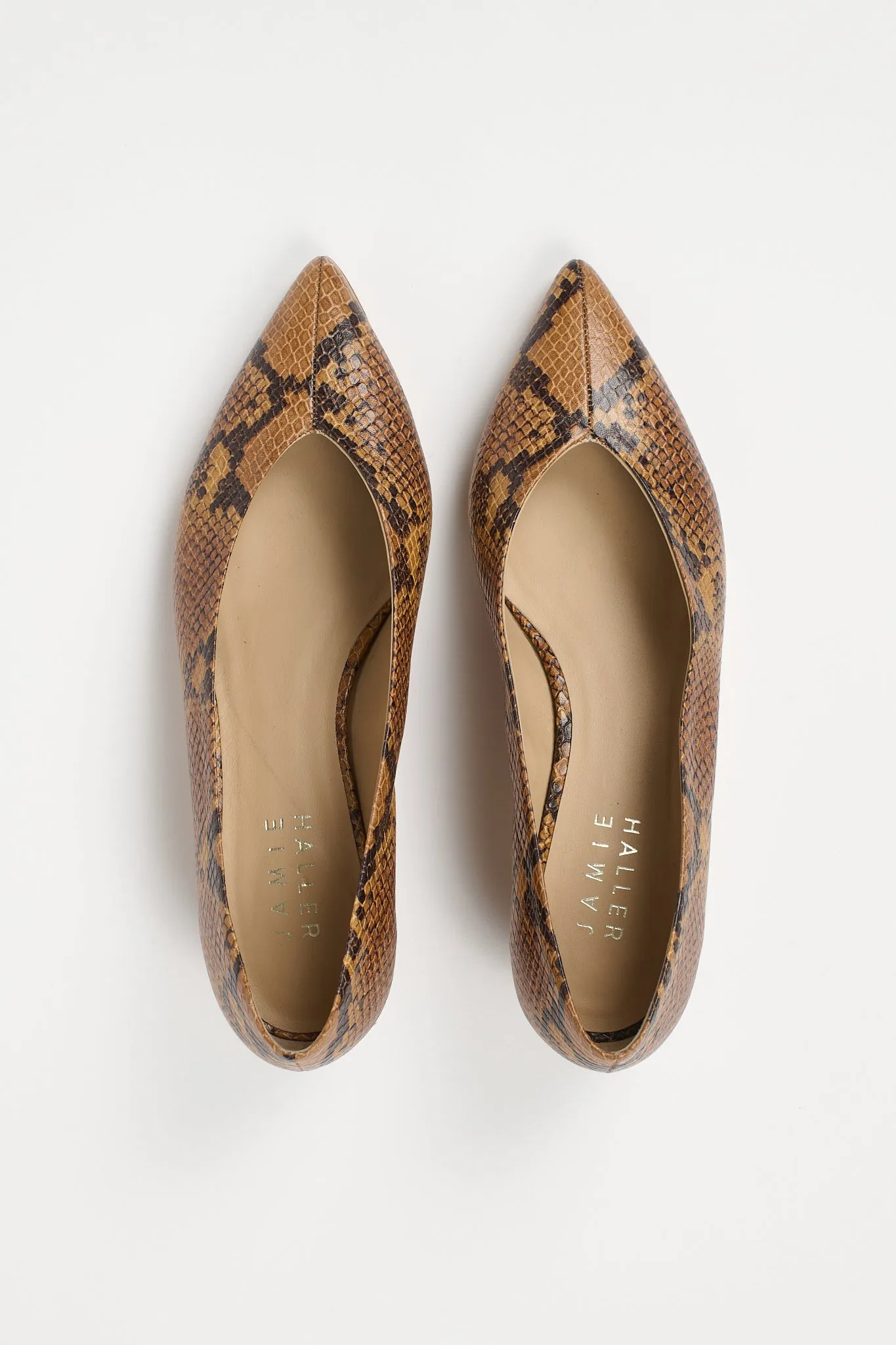 The Trap Pump in Mustard Python sold by Jamie Haller