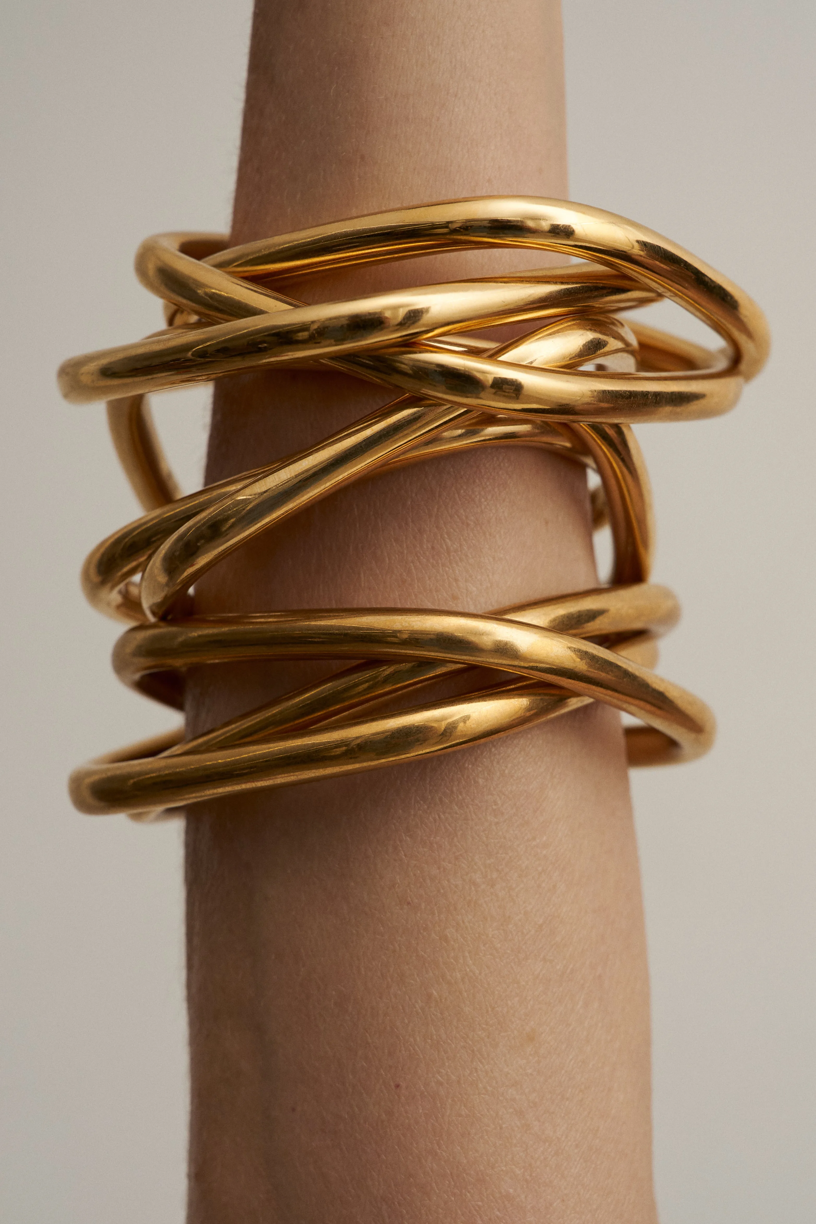 The Interlocking Bangle in Gold sold by Jamie Haller product image thumbnail 3