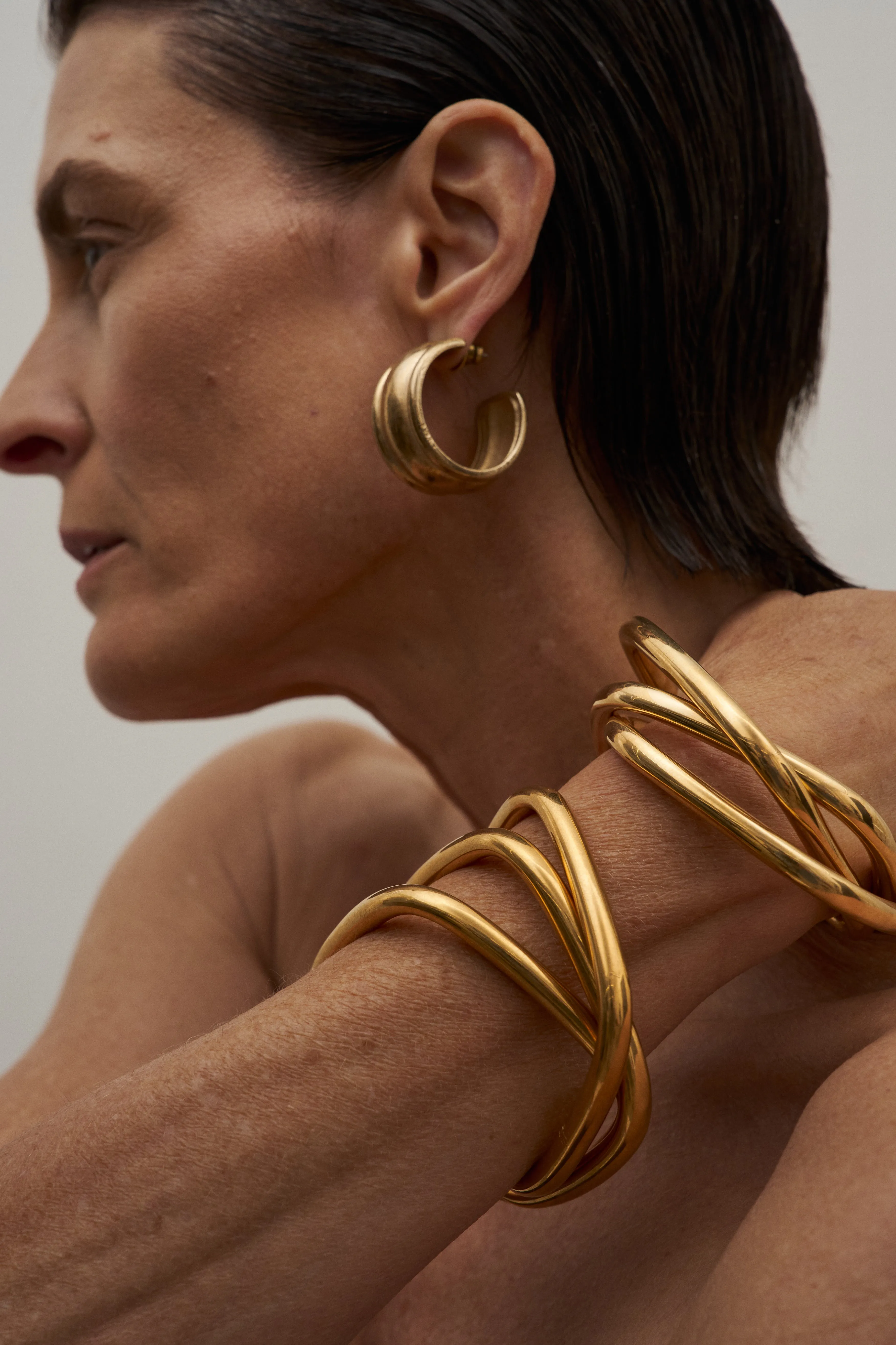 The Interlocking Bangle in Gold sold by Jamie Haller product image thumbnail 2