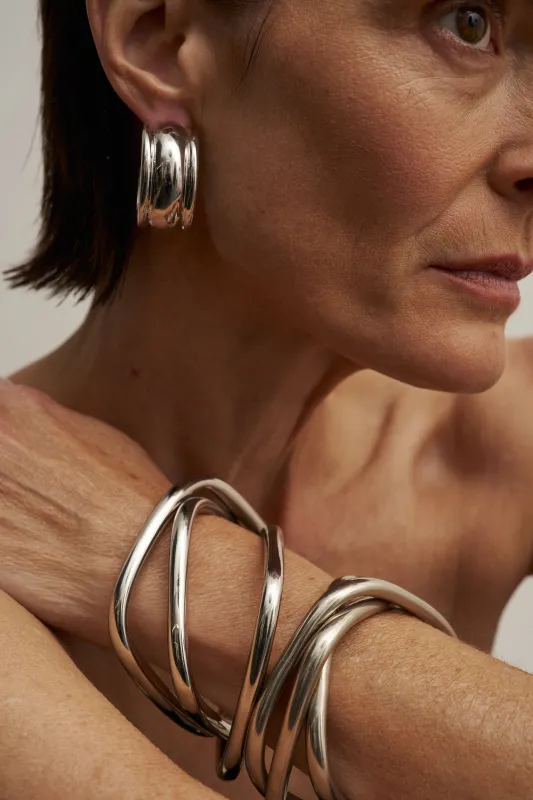 The Interlocking Bangle in Sterling Silver made by Jamie Haller