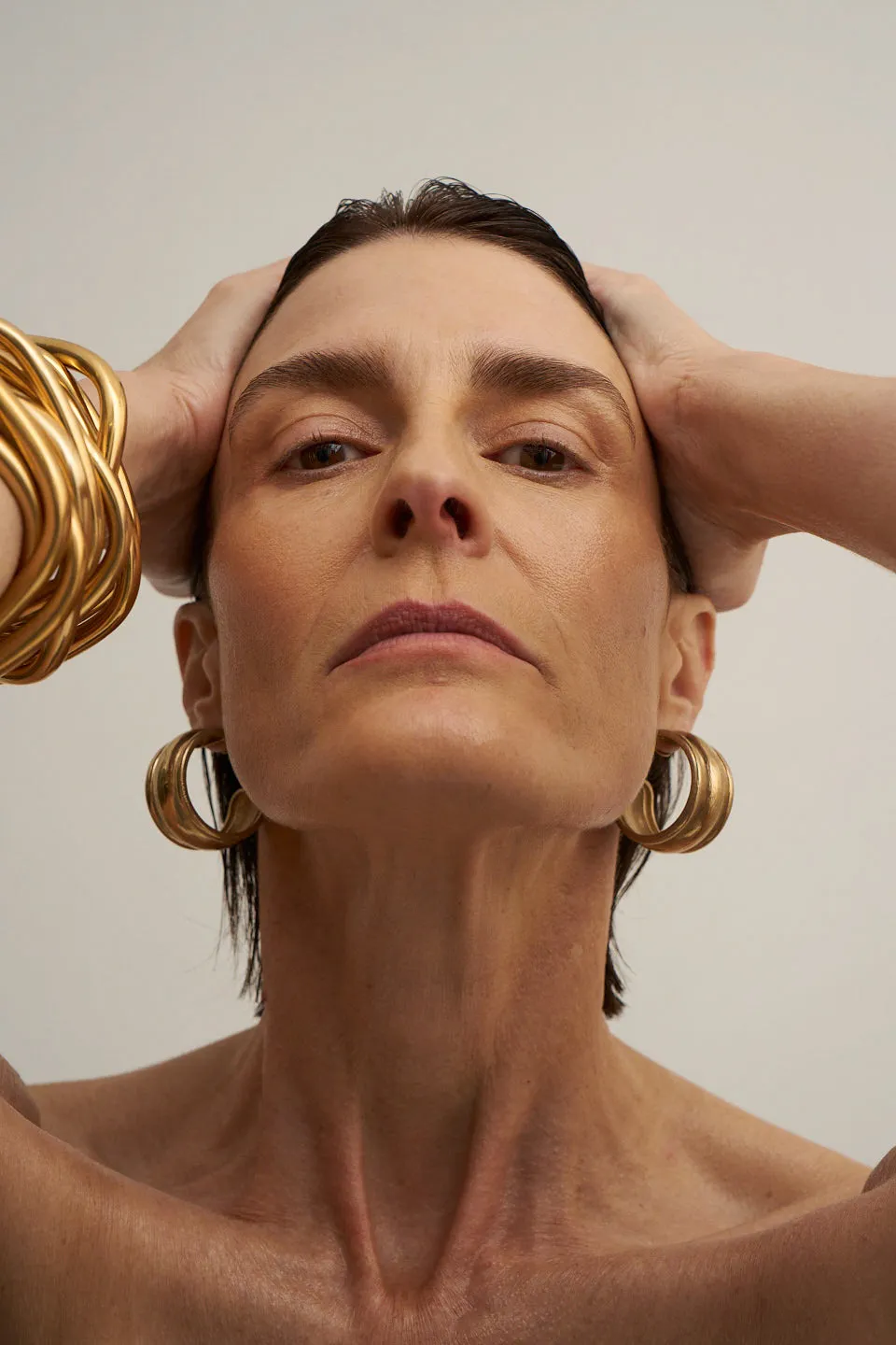 The Vera Hoop Earring in Gold sold by Jamie Haller product image thumbnail 4