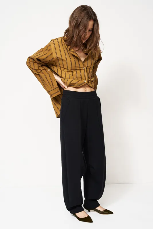 The Pintuck Track Pant in Black made by Jamie Haller