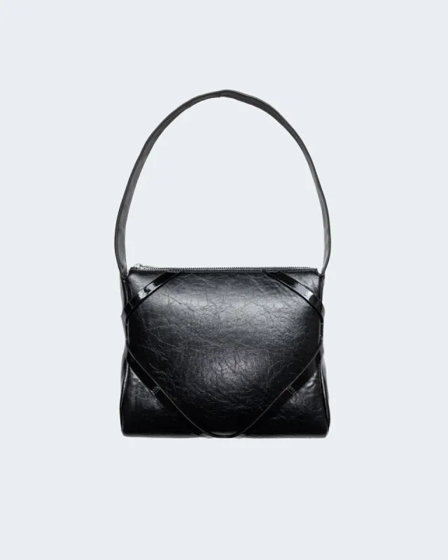 The Pillow Bag in Black sold by Puppets and Puppets