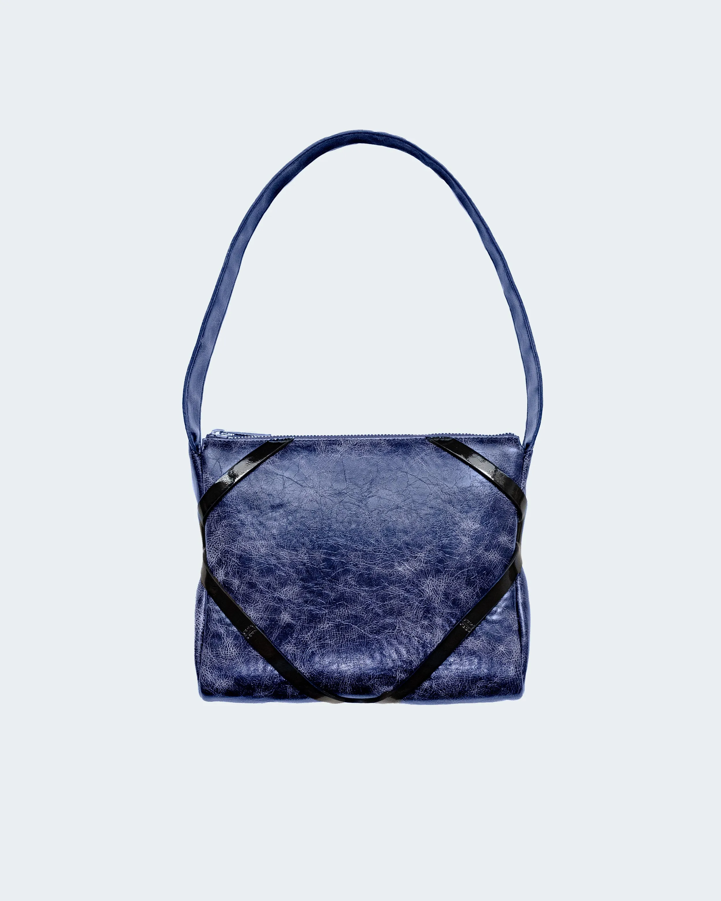 The Pillow Bag in Blue sold by Puppets and Puppets