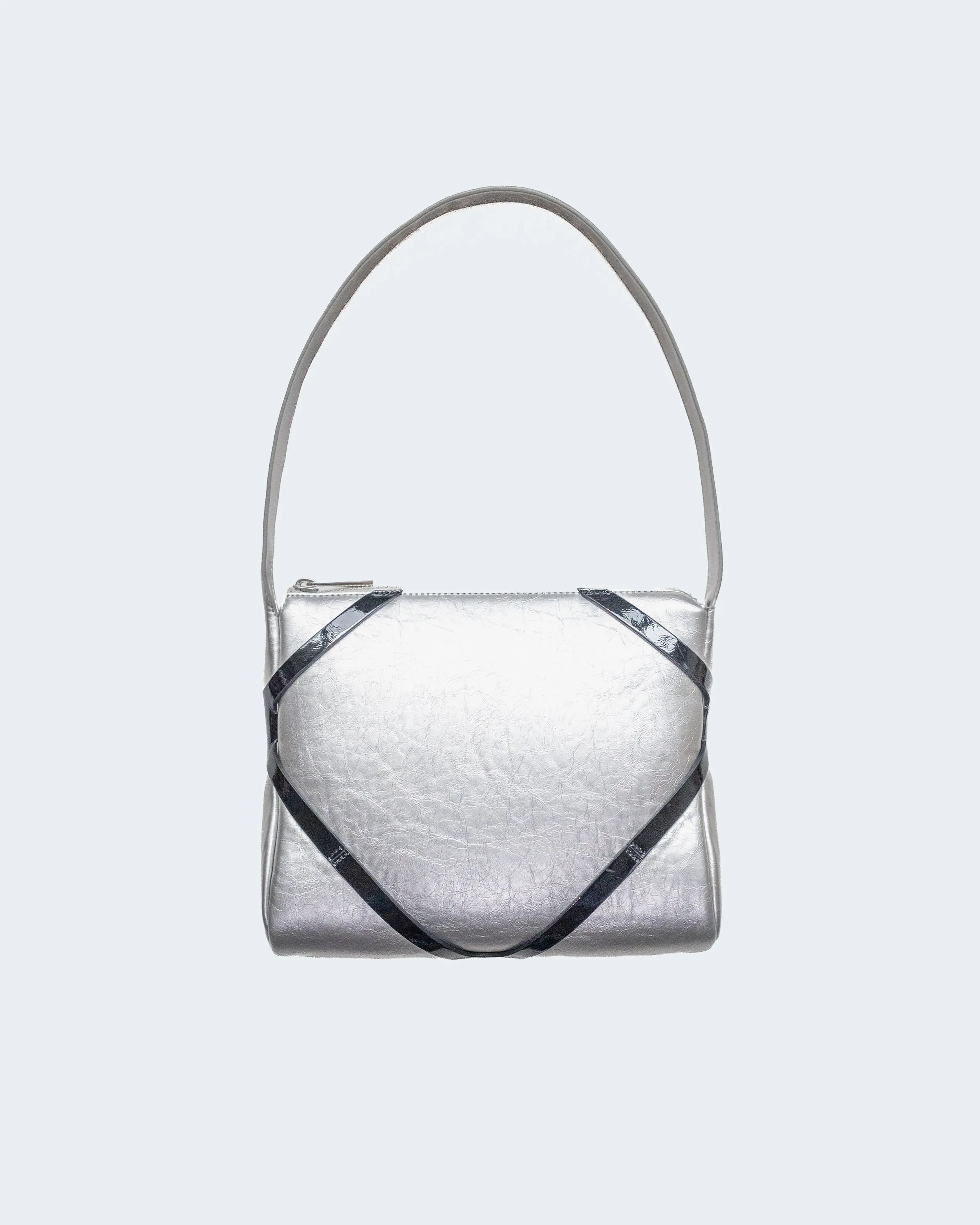 The Pillow Bag in Silver sold by Puppets and Puppets