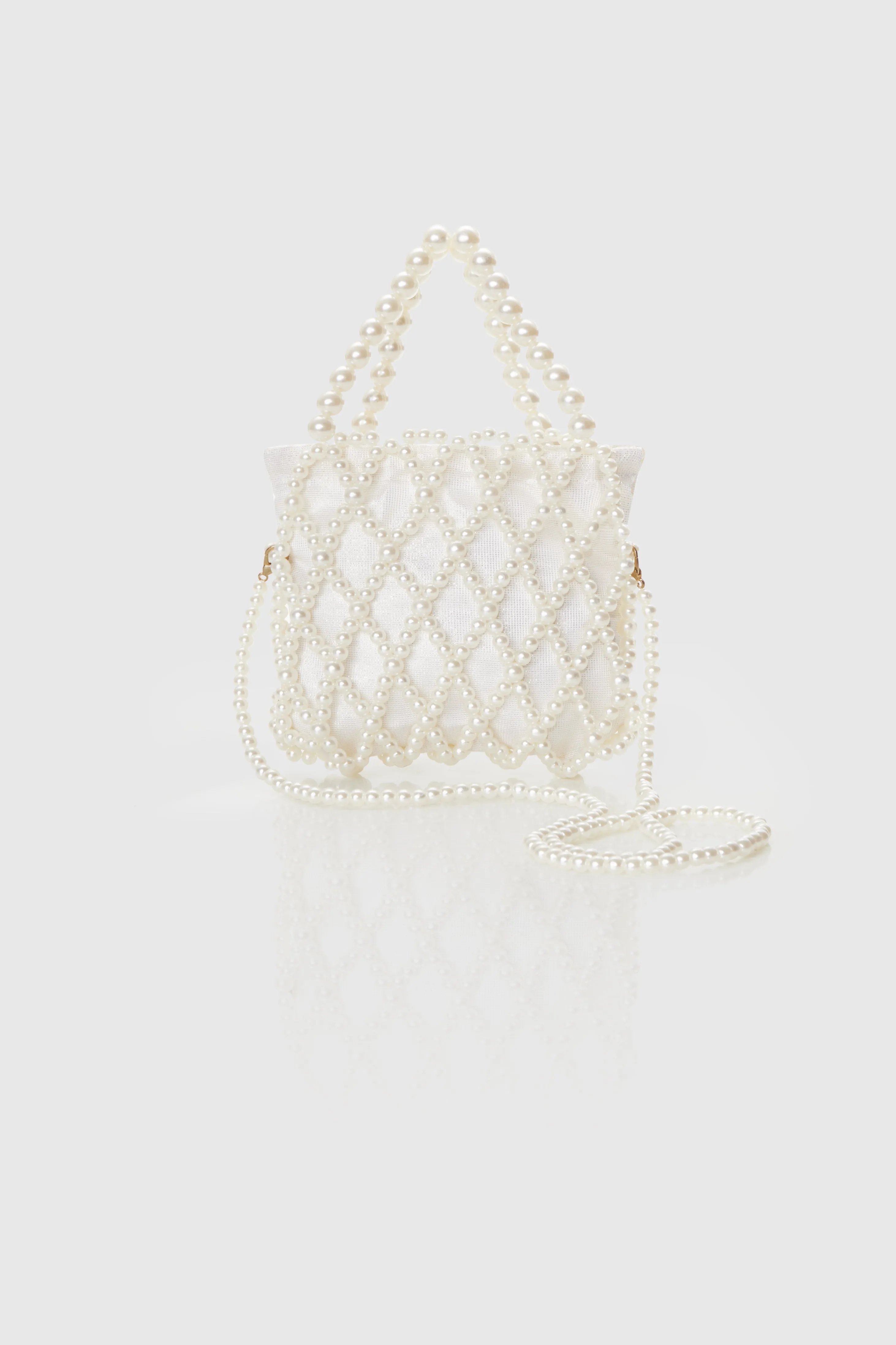 Reticulated Beaded Pearl Bucket Purse sold by BABEYOND