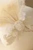 Gorgeous Beaded Feather Hairband sold by BABEYOND