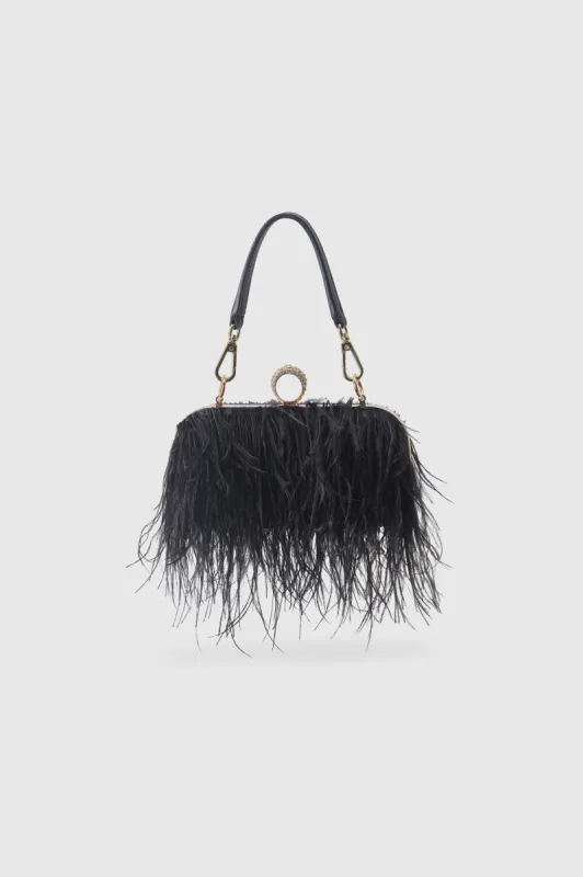 1920s Luxury Ostrich Feather Clutch sold by BABEYOND