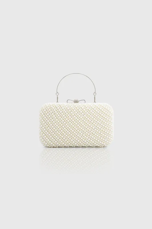 Vintage Pearl Crystal Clutch sold by BABEYOND