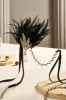 Retro Feather Gatsby Headband sold by BABEYOND
