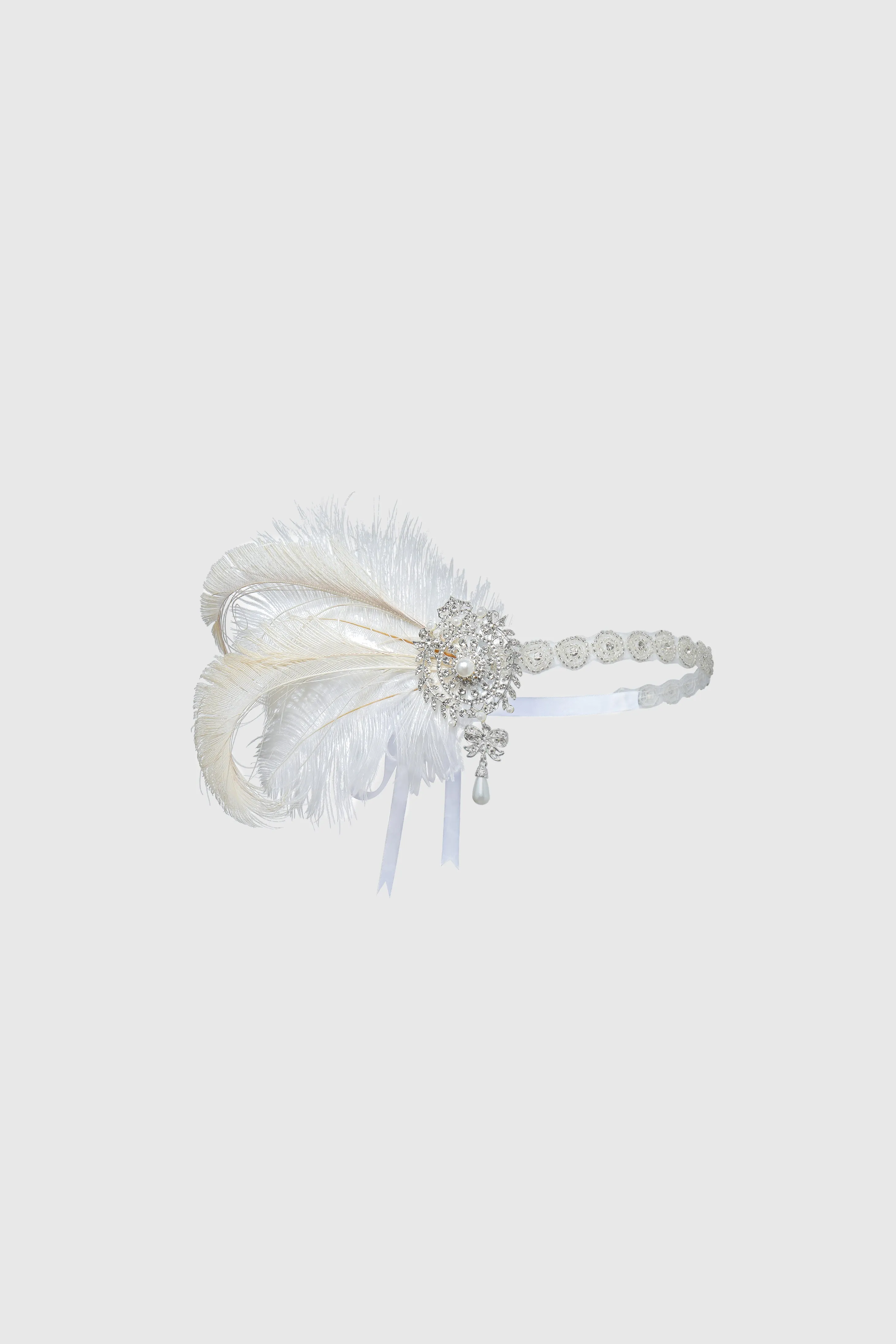 Fancy Embellished Feather Hairband sold by BABEYOND