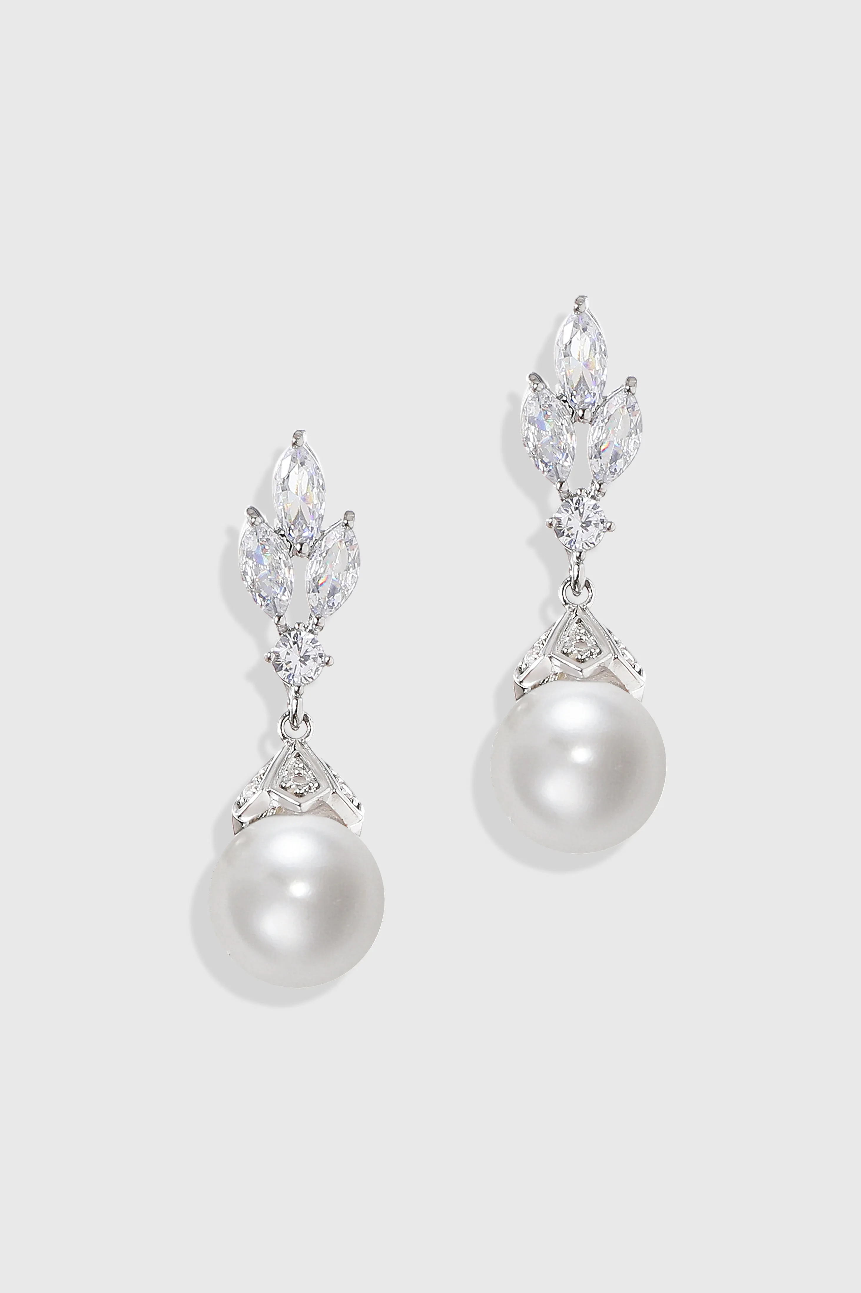 Radiant Leaf-Embellished Pearl Drop Earrings sold by BABEYOND