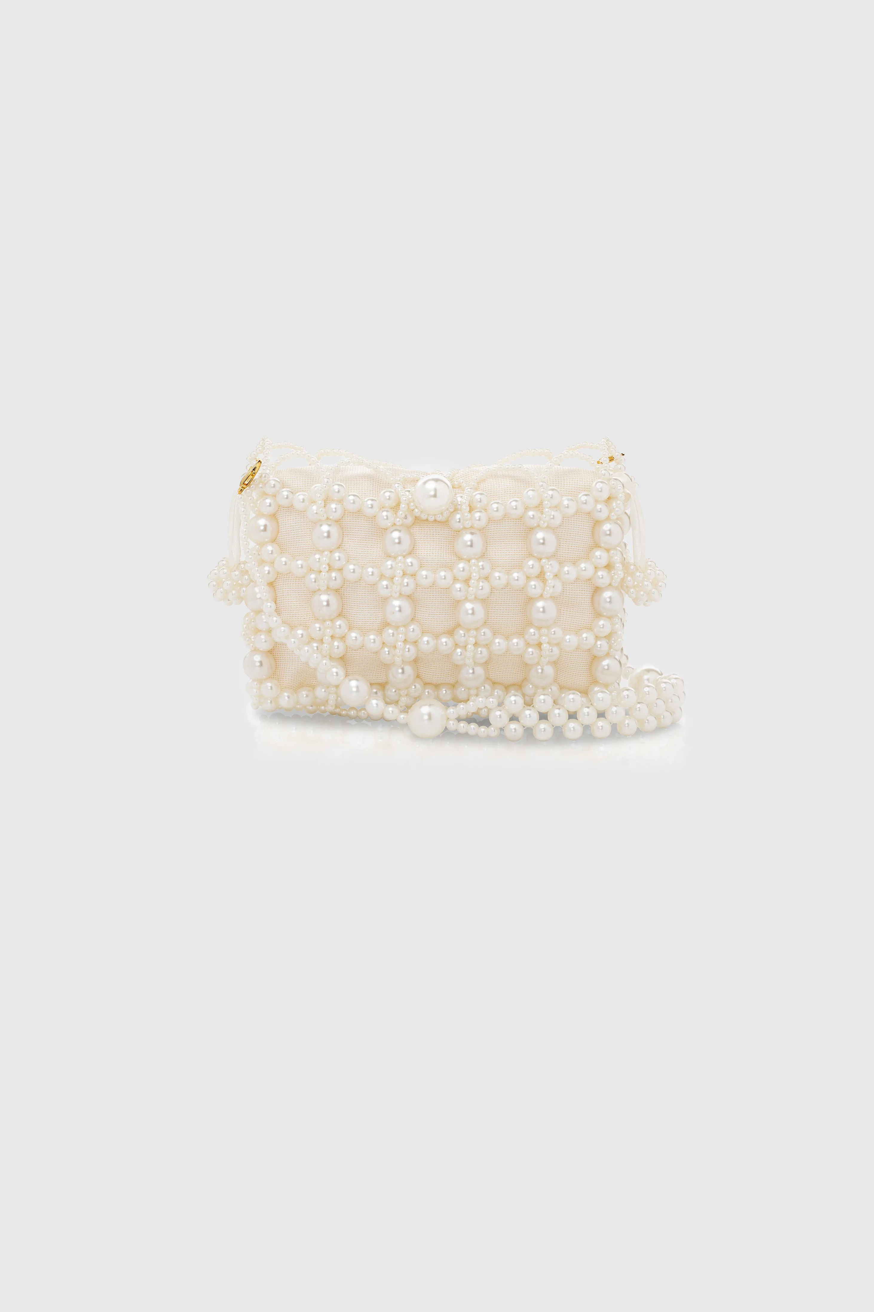 Reticulated Beaded Pearl Evening Handbag sold by BABEYOND
