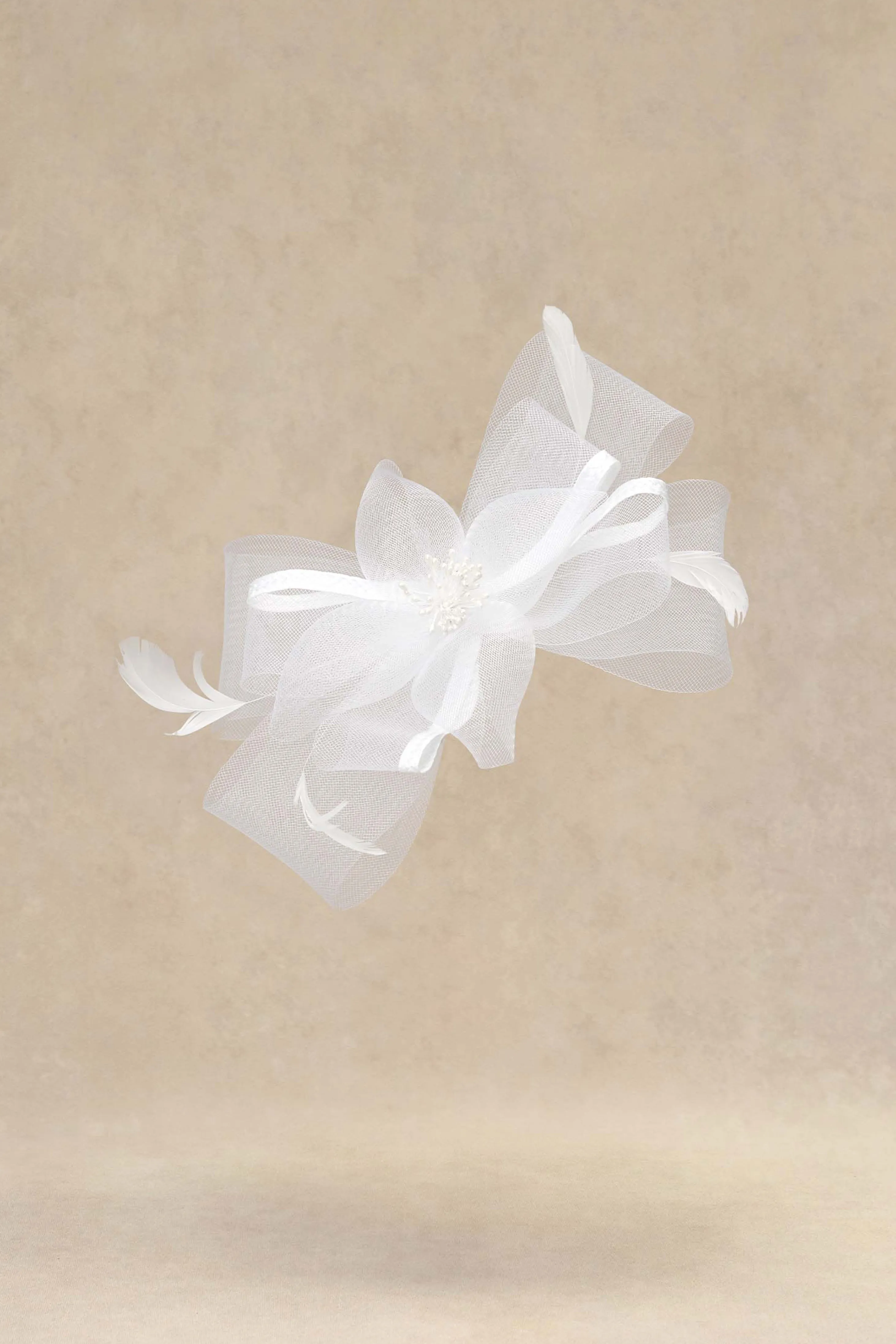 Elegant Ribbon Feather Kentucky Fascinator sold by BABEYOND