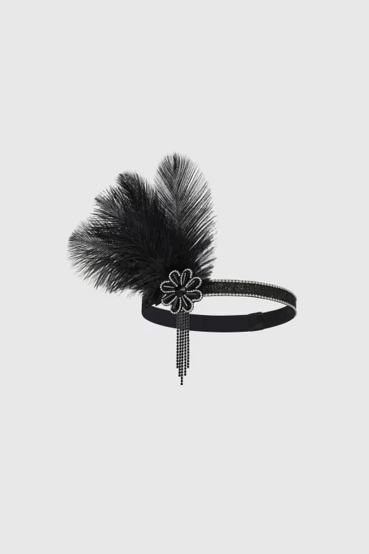 Shimmering Beaded Feather Headpiece sold by BABEYOND