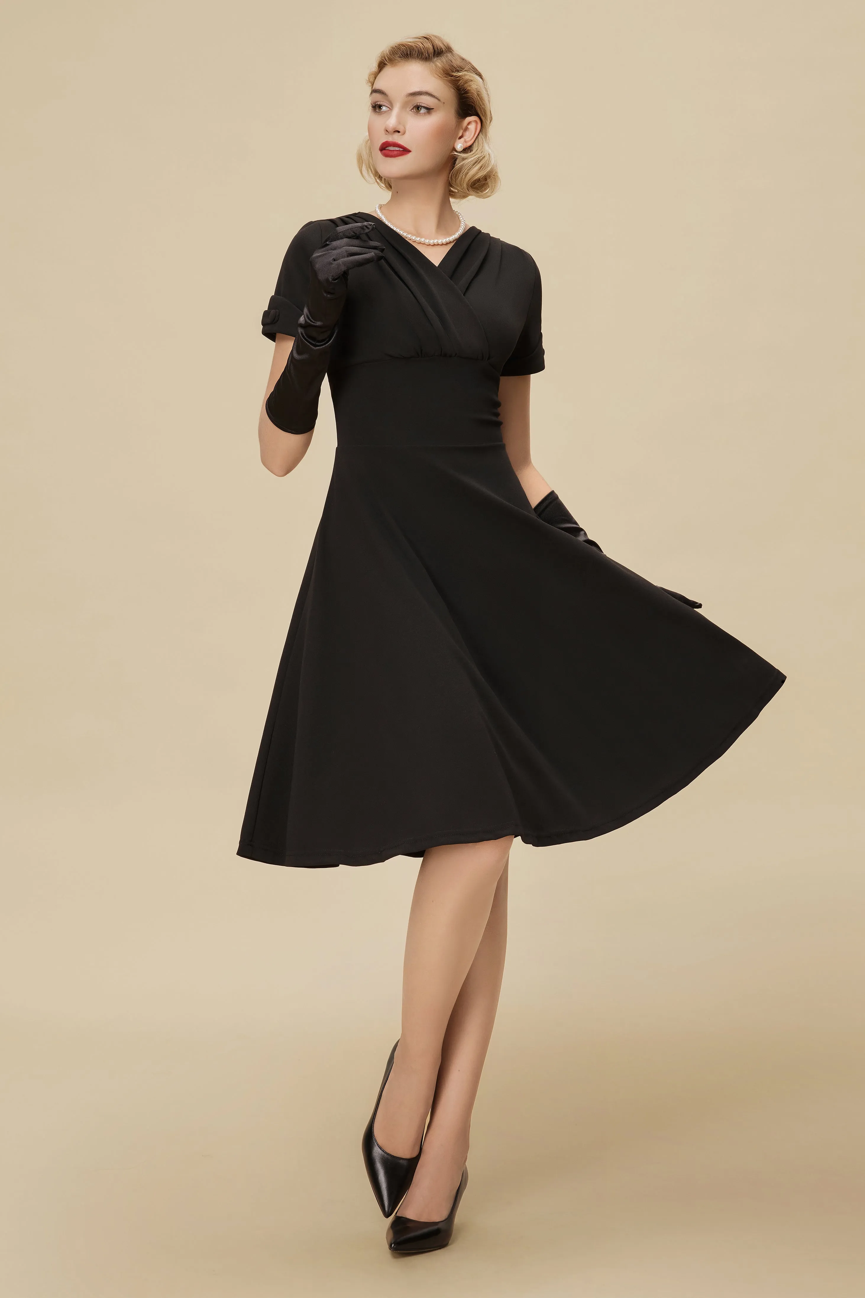 Refined Vintage-Inspired Pleated Swing Dress sold by BABEYOND