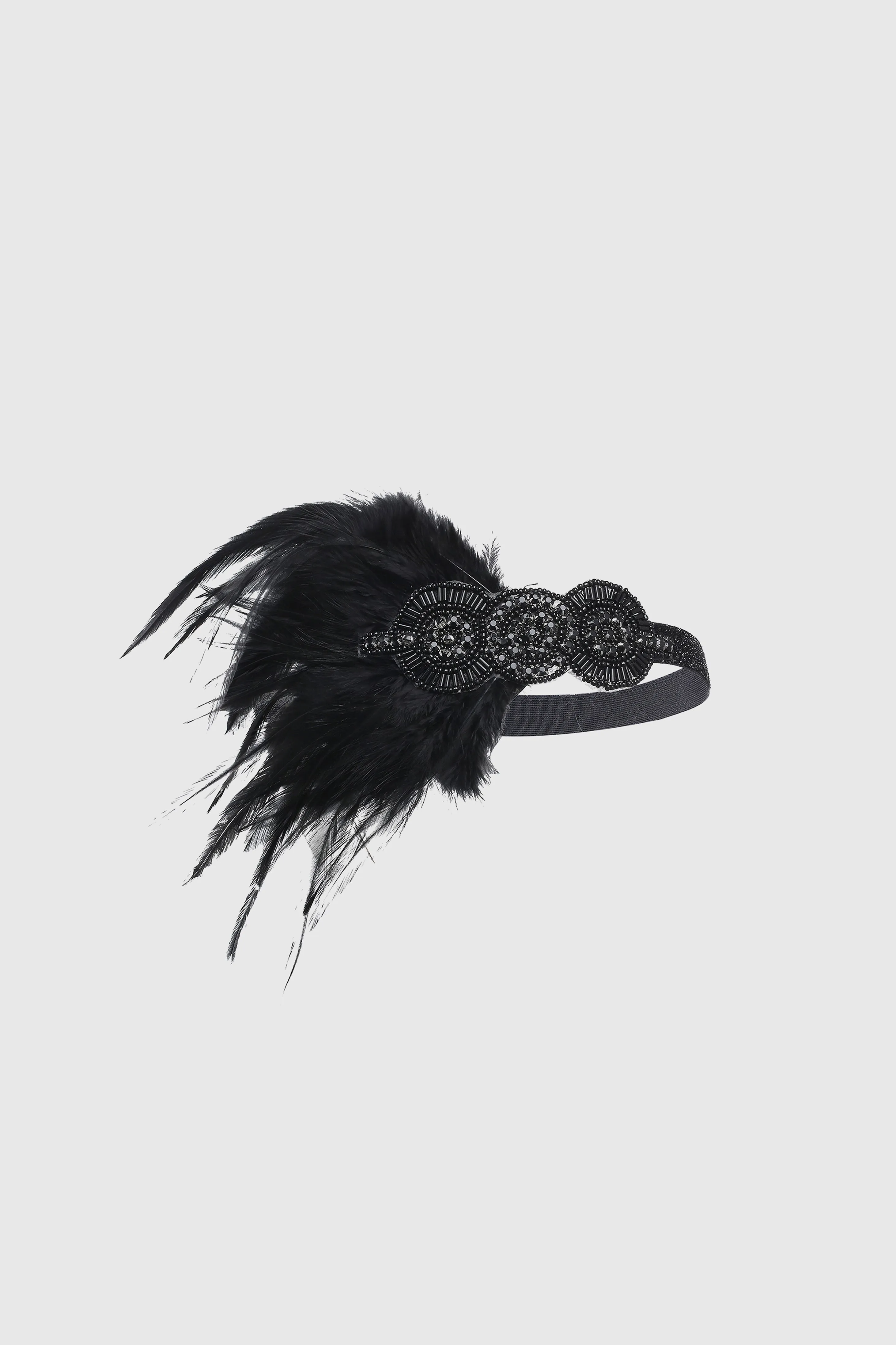 Crystal Studded Feather Headband sold by BABEYOND