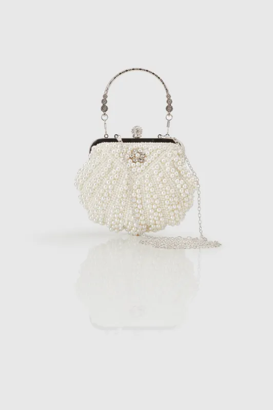 Shell Shaped Pearl Beaded Clutch sold by BABEYOND