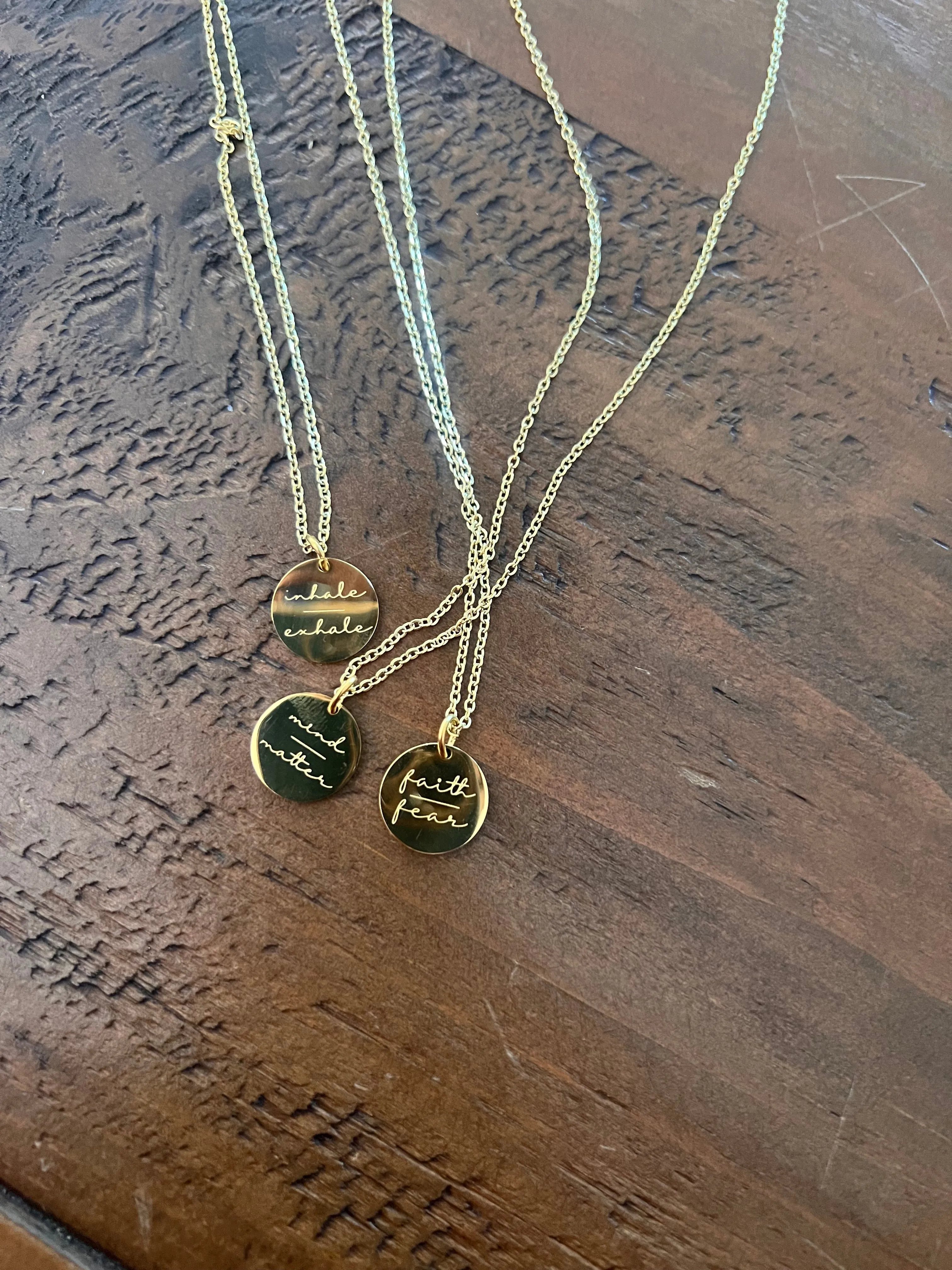simple mantra necklaces sold by bubs & sass