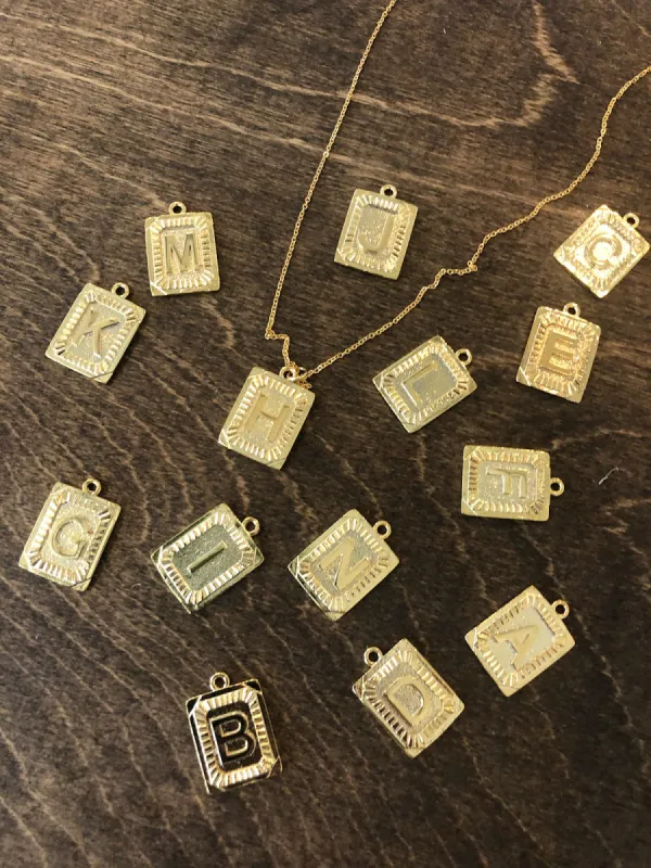 rectangle initial pendant necklace sold by bubs & sass