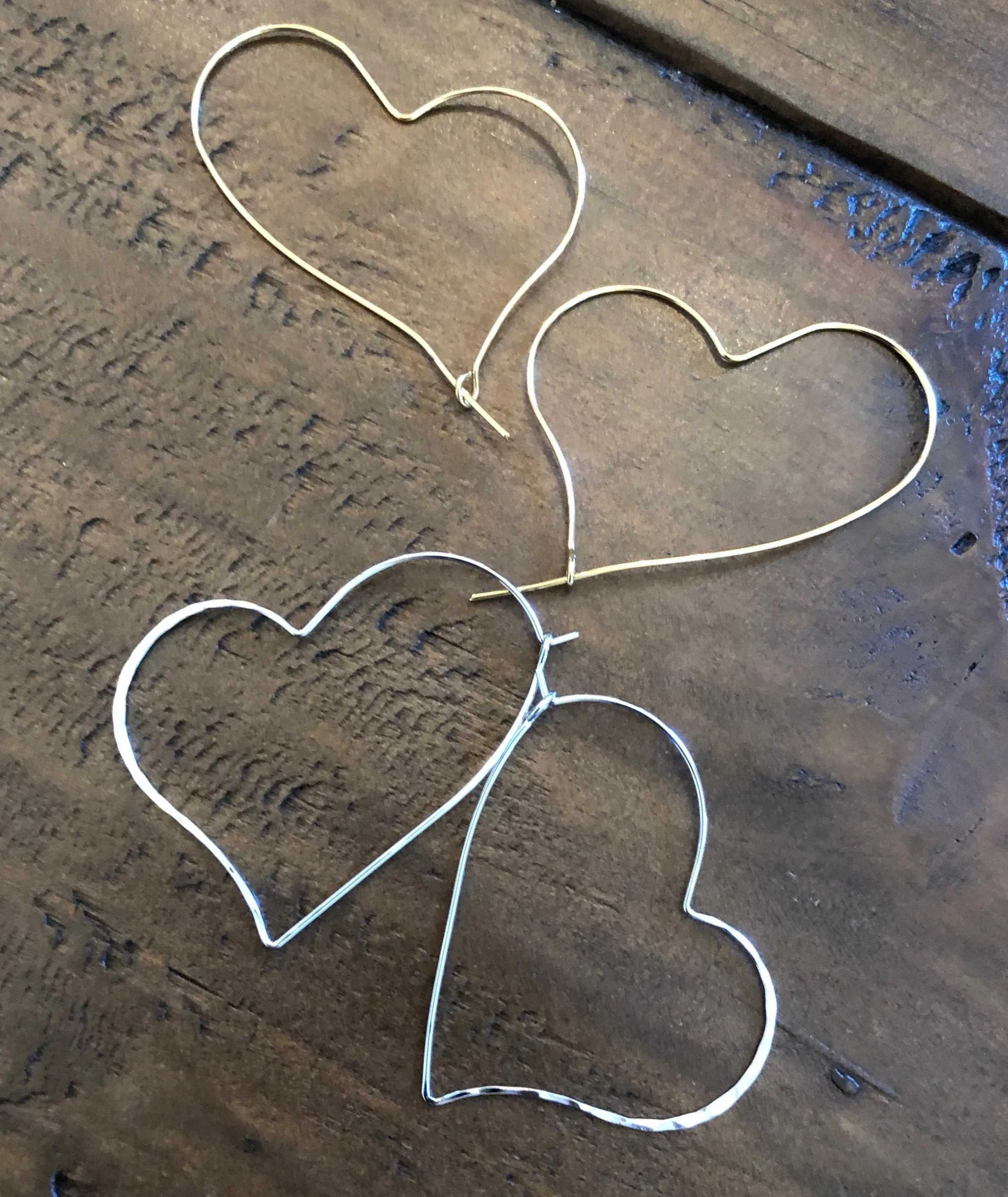 hammered heart hoop earrings sold by bubs & sass
