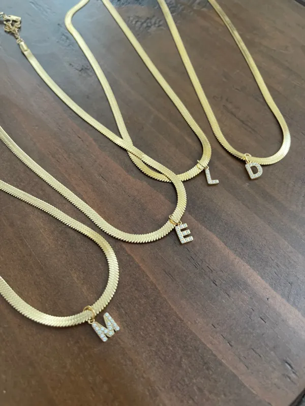 cz initial pendant necklace sold by bubs & sass