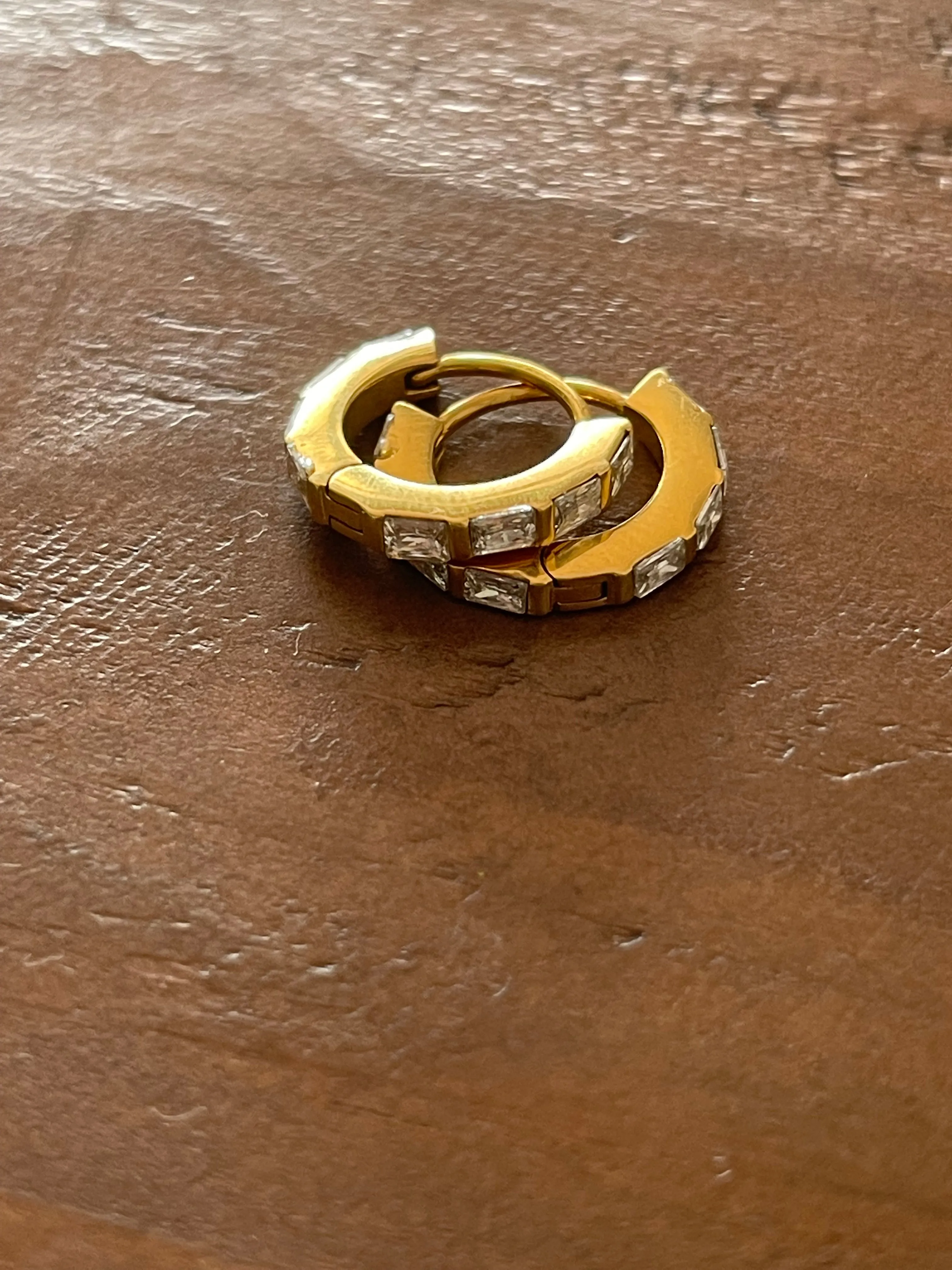 thick cz huggie earrings sold by bubs & sass