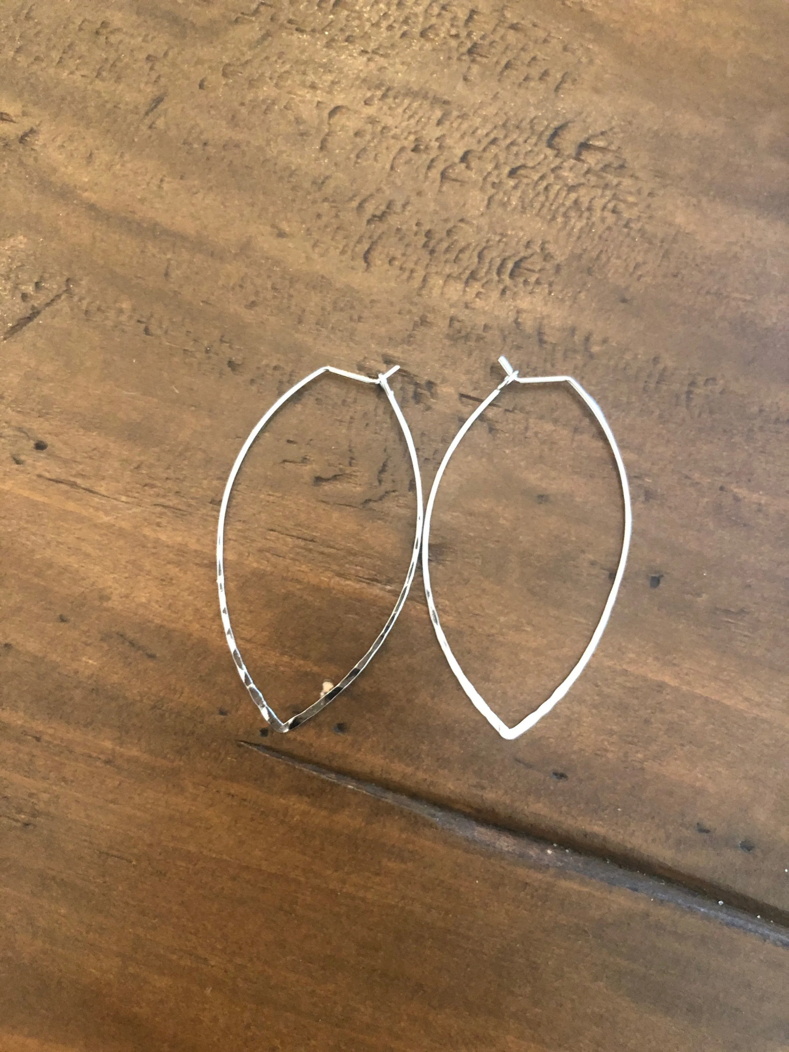 hammered marquis wired earrings sold by bubs & sass