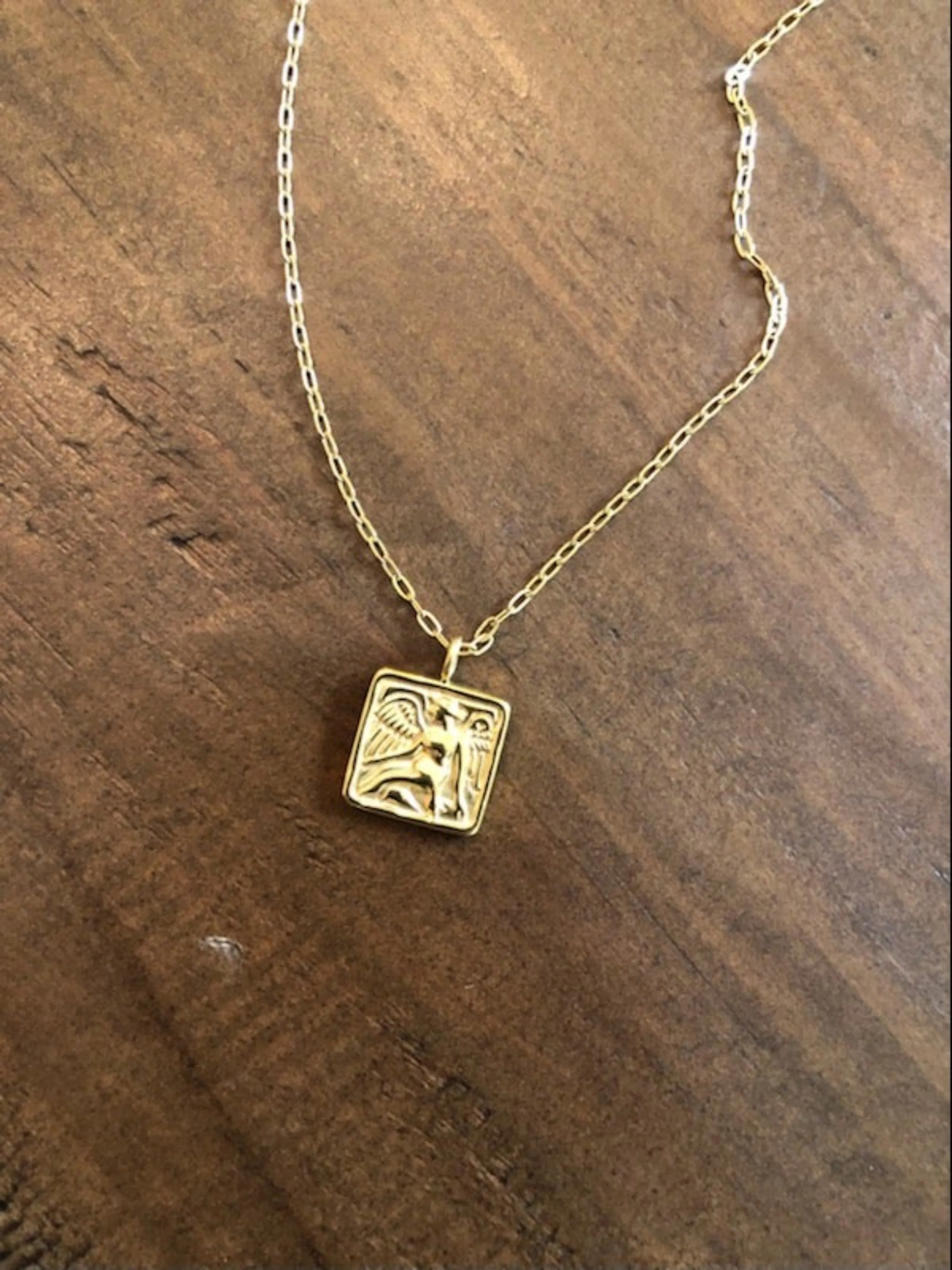 angel coin necklace sold by bubs & sass