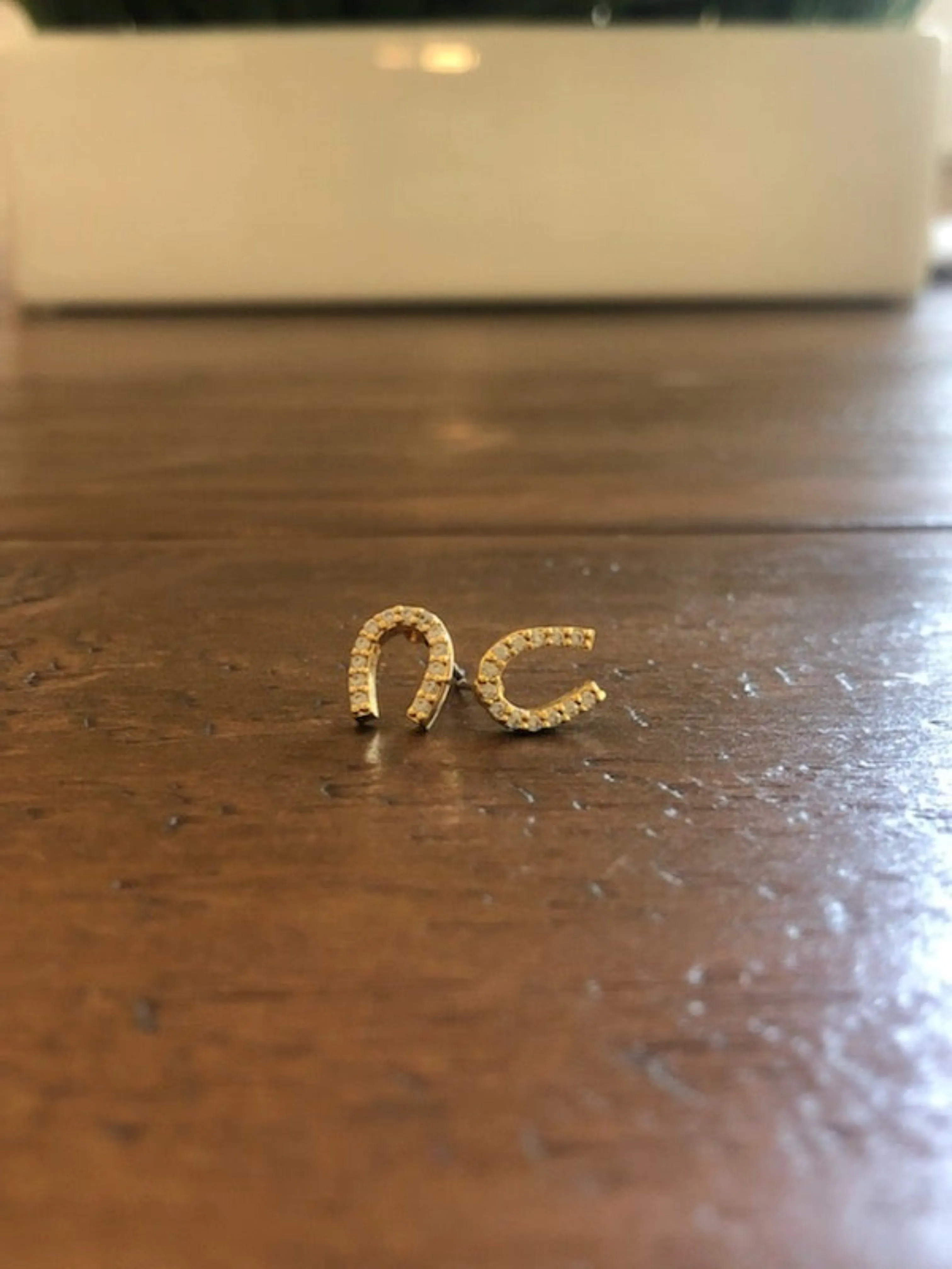 cz lightning bolt/horseshoe stud earrings sold by bubs & sass product image thumbnail 3