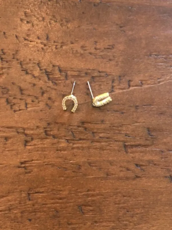 cz lightning bolt/horseshoe stud earrings sold by bubs & sass