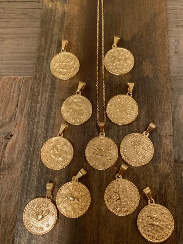 large zodiac coin pendant necklace sold by bubs & sass