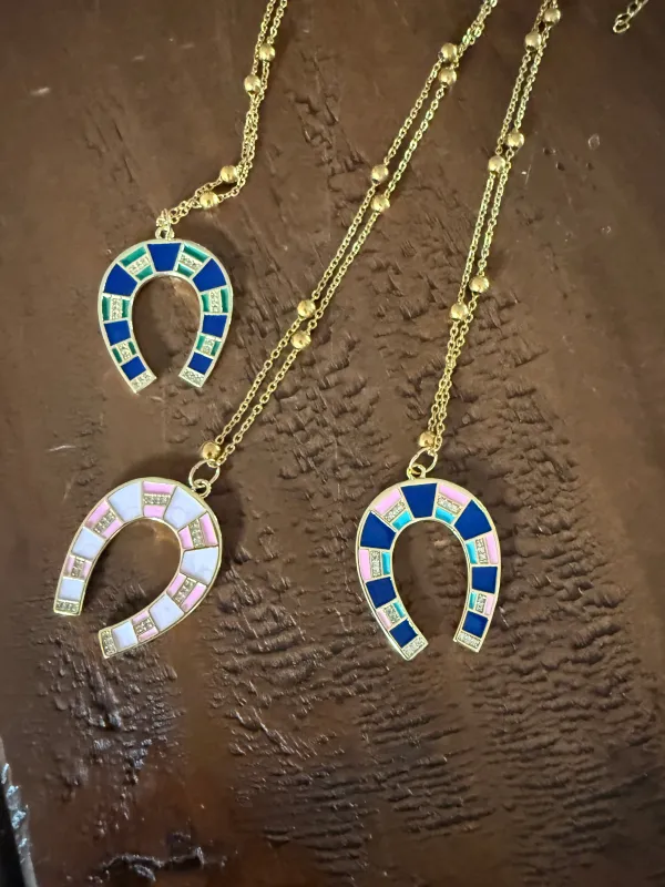 large horseshoe pendants made by bubs & sass