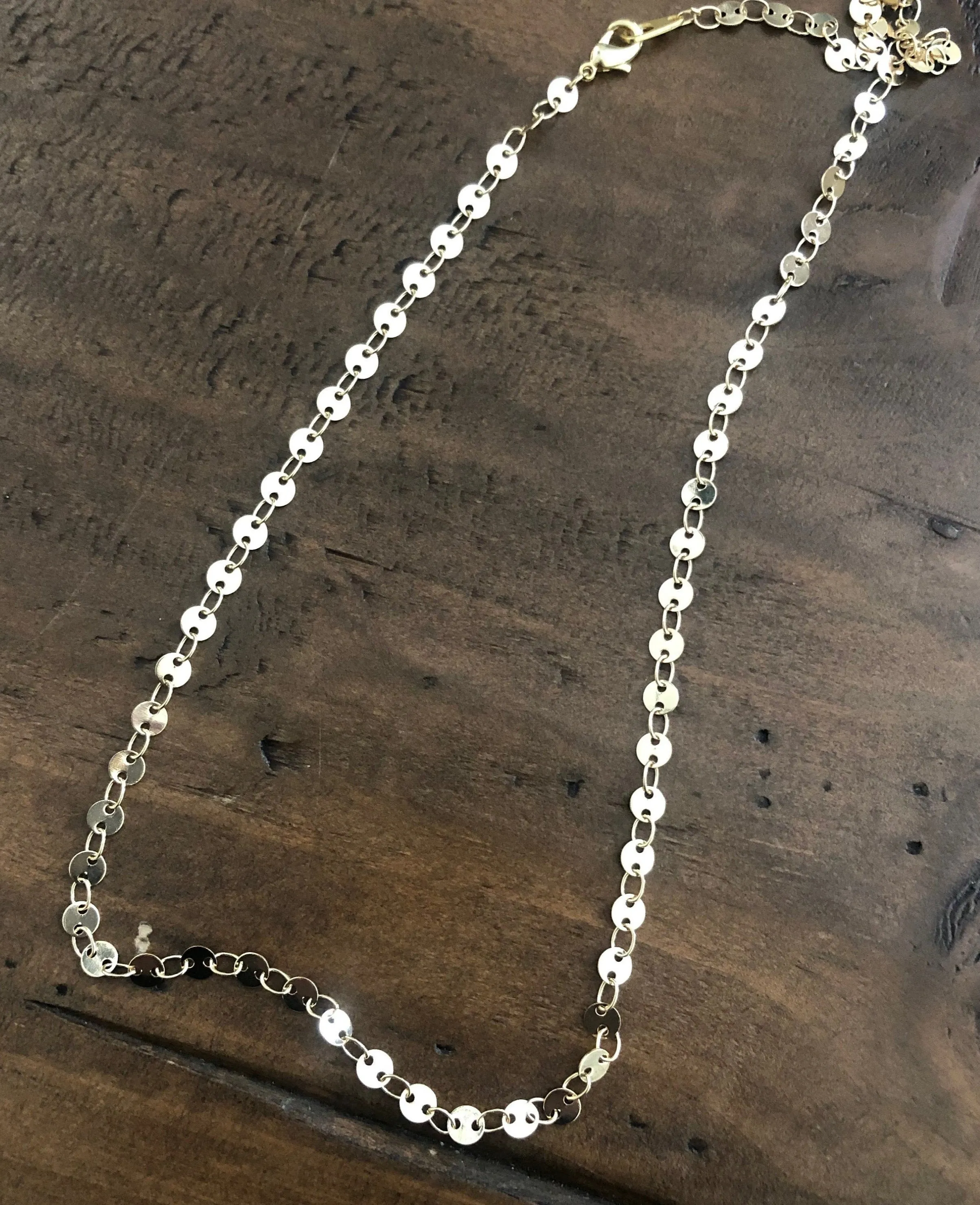 tiny gold disc choker necklace sold by bubs & sass