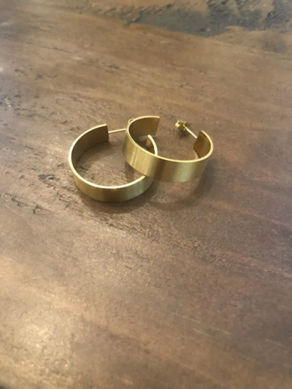 thick matte gold hoop earrings sold by bubs & sass