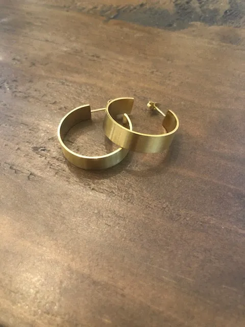 thick matte gold hoop earrings sold by bubs & sass
