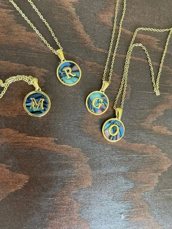 round abalone initial pendant necklace sold by bubs & sass product image thumbnail 3