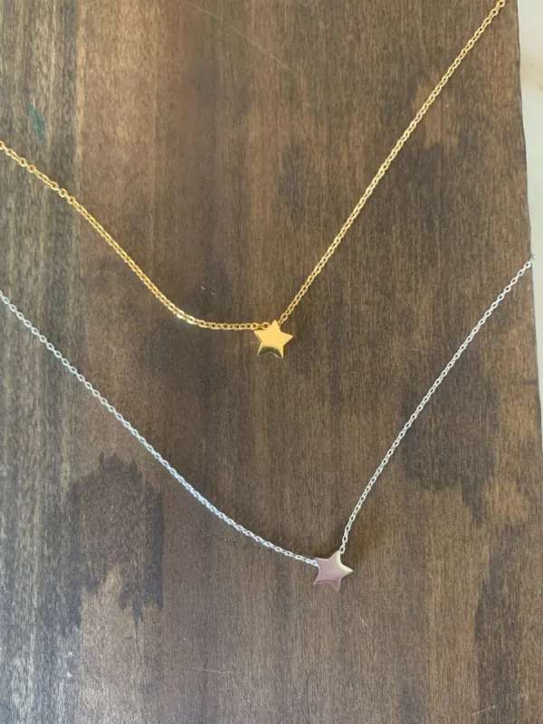 tiny star pendant necklace sold by bubs & sass