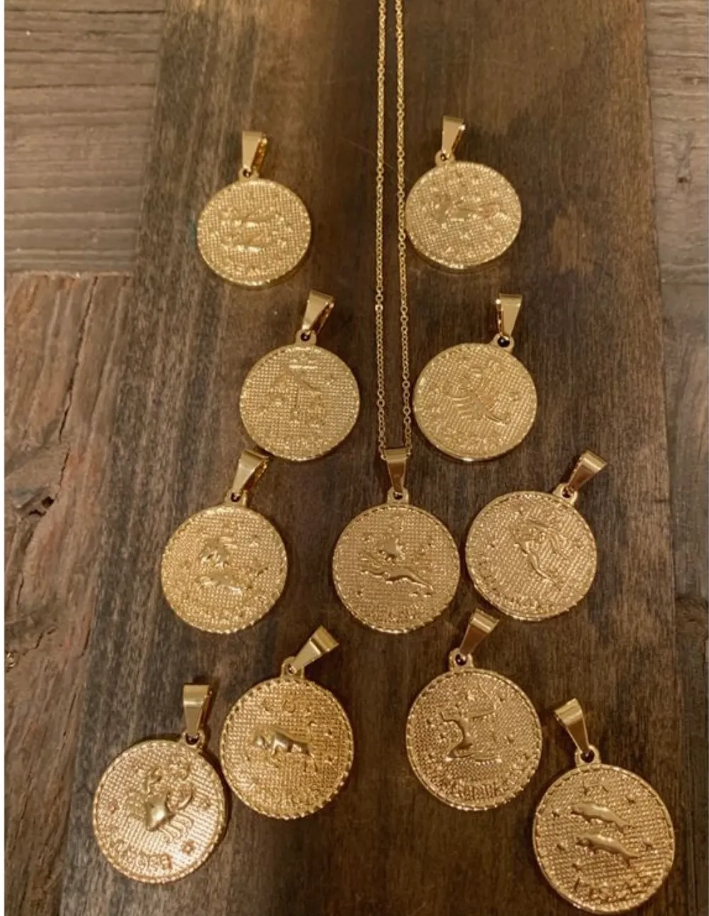 zodiac sign pendant sold by bubs & sass