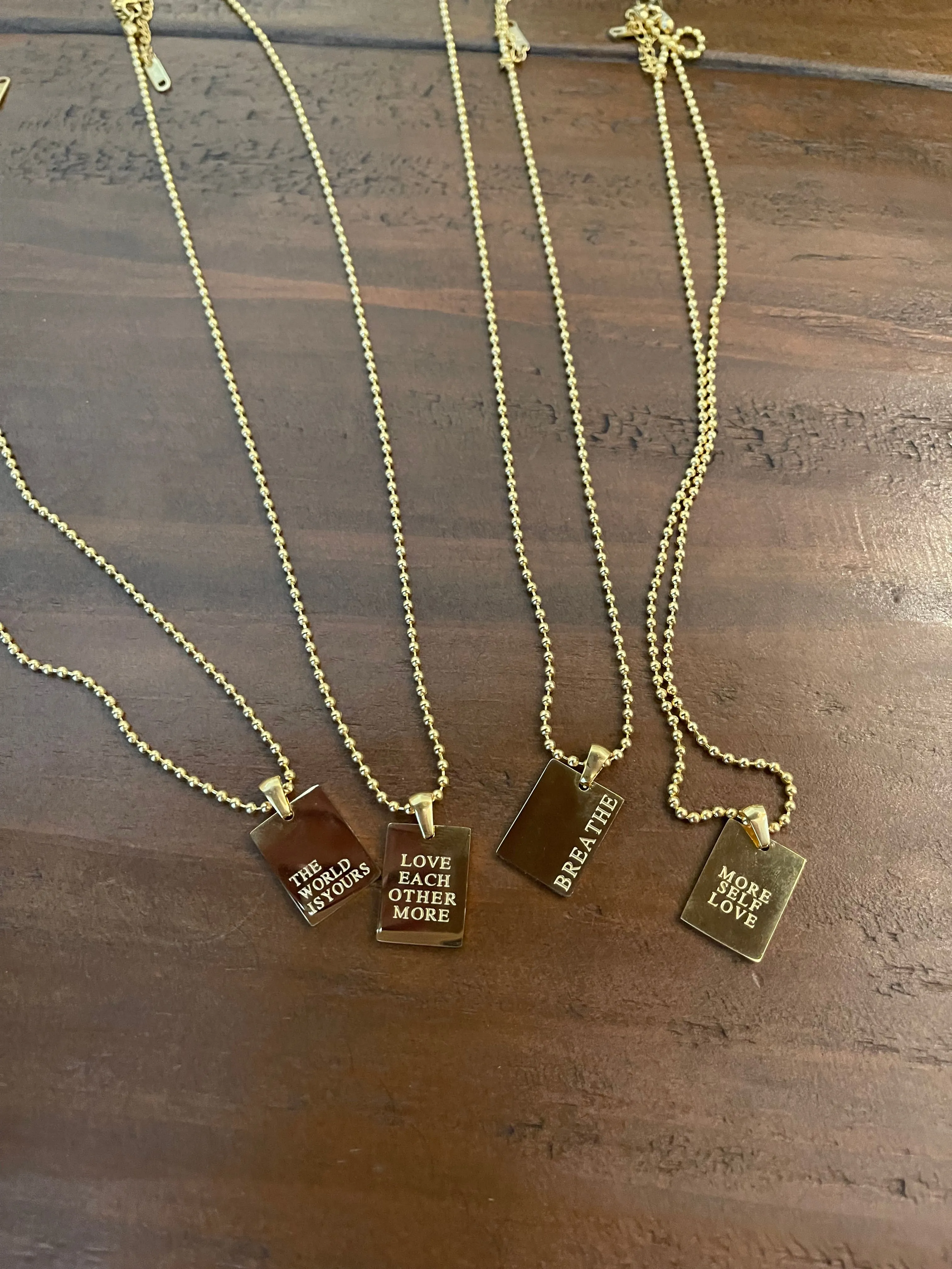 inspiration tag necklaces sold by bubs & sass