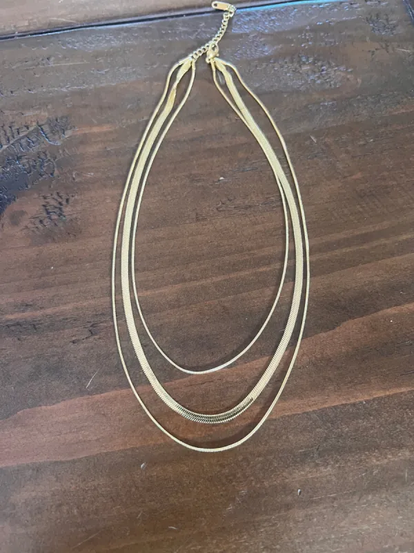 all-in-one triple snake chain necklace sold by bubs & sass